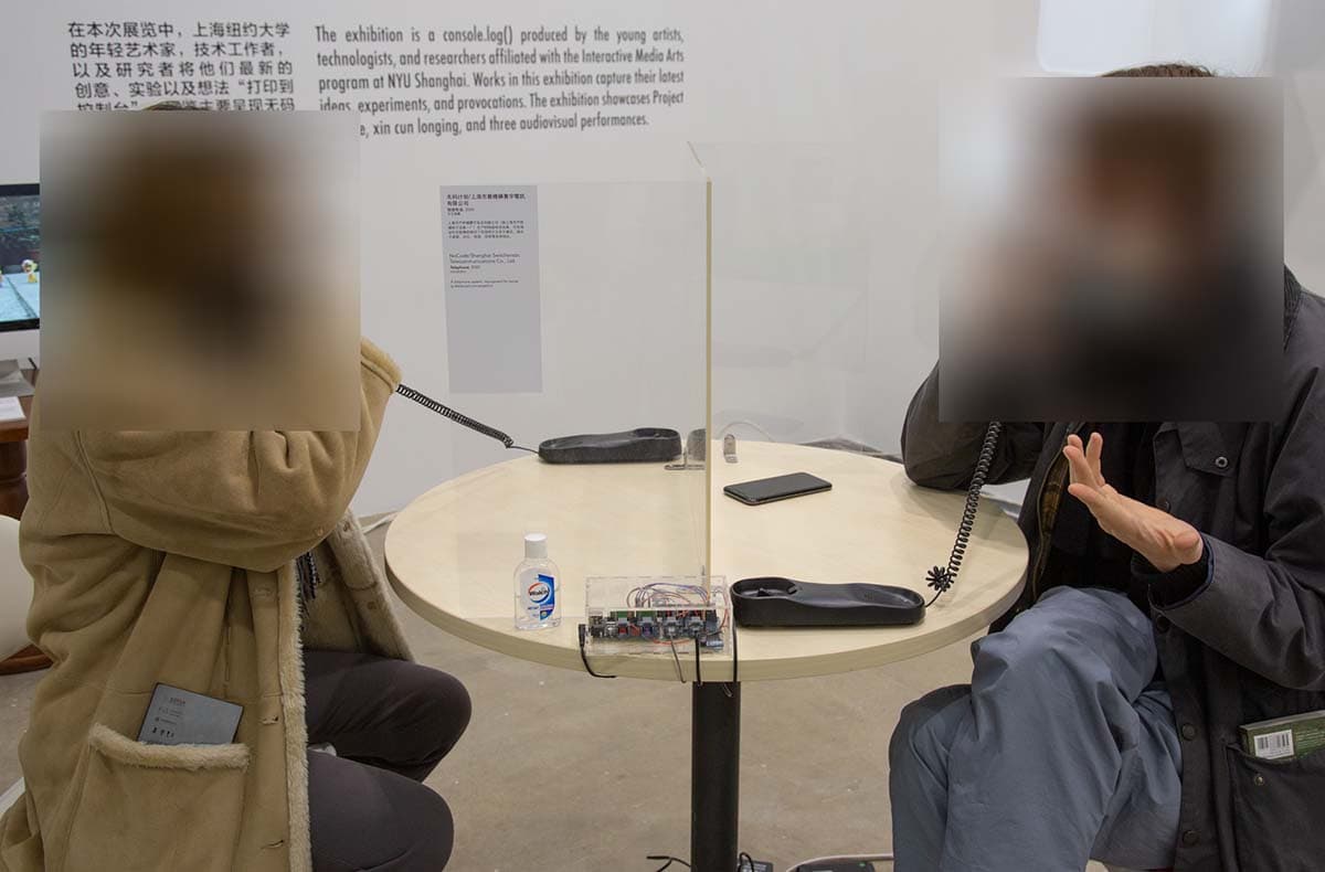 Two people talking on the phone